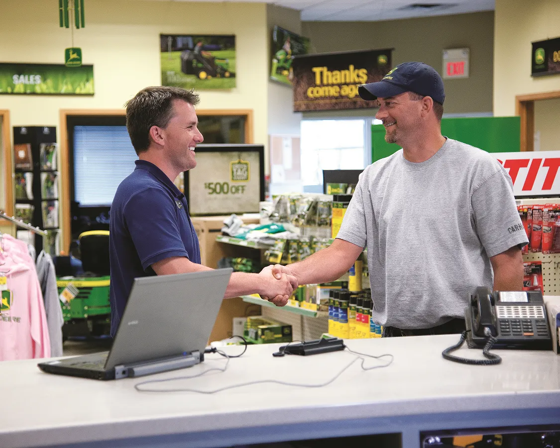 Conversation between two men at parts counter