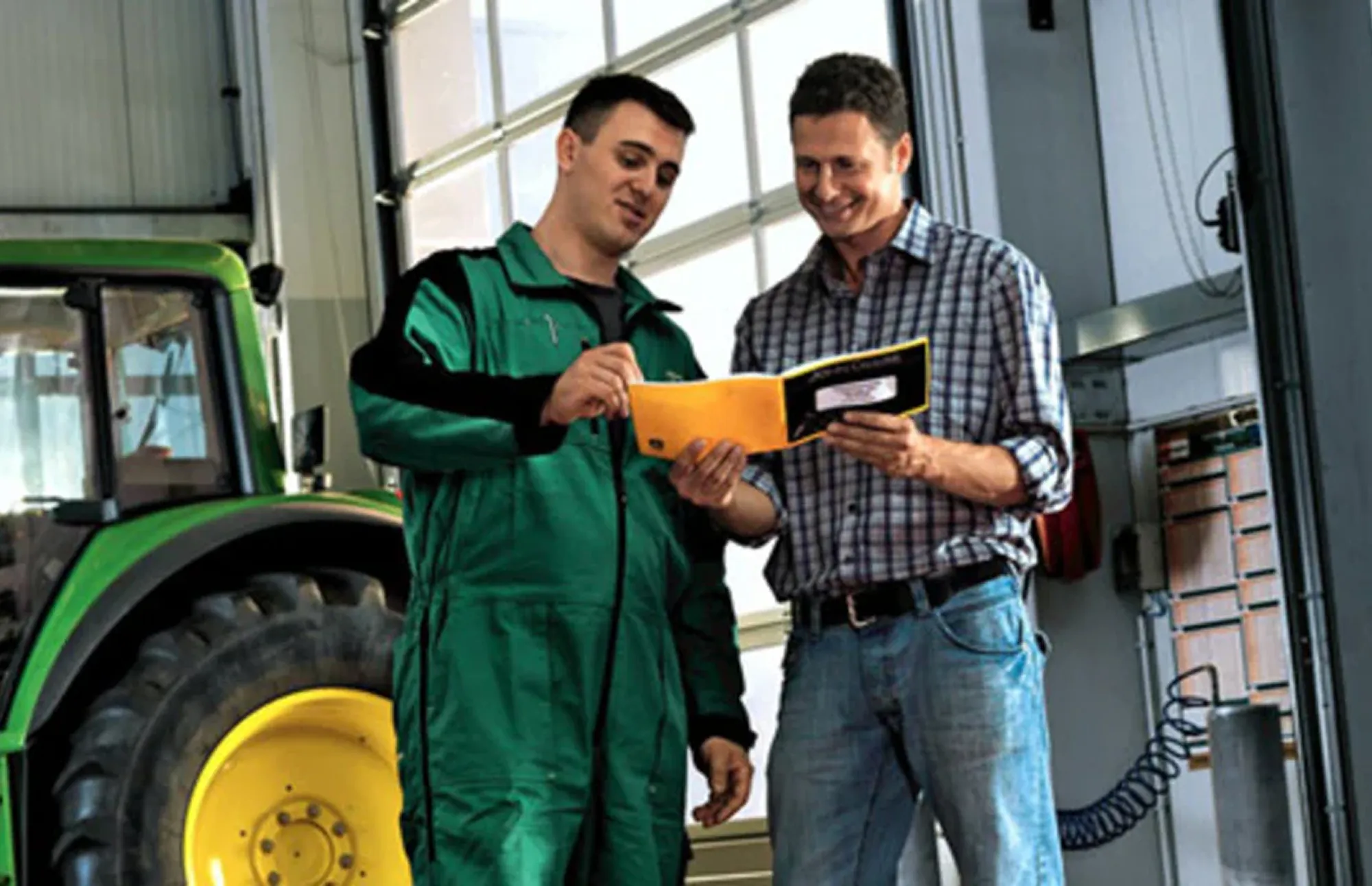 Dealer reviewing warranty with customer