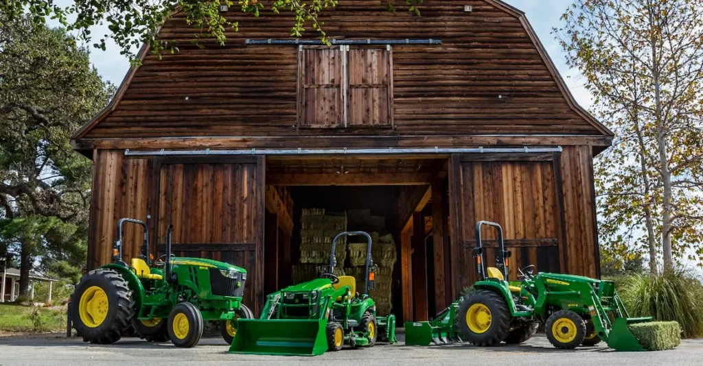 Barn with tractors lined up out front
